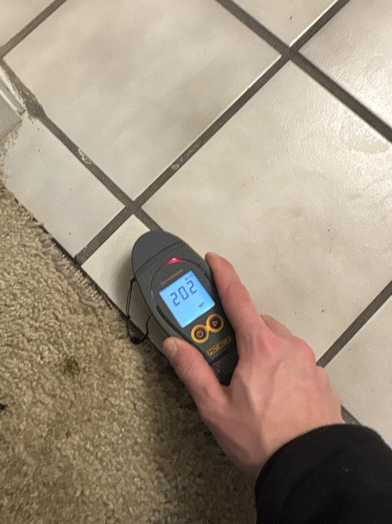 Bathroom water damage requiring professional restoration services in a Bloomington Indiana home