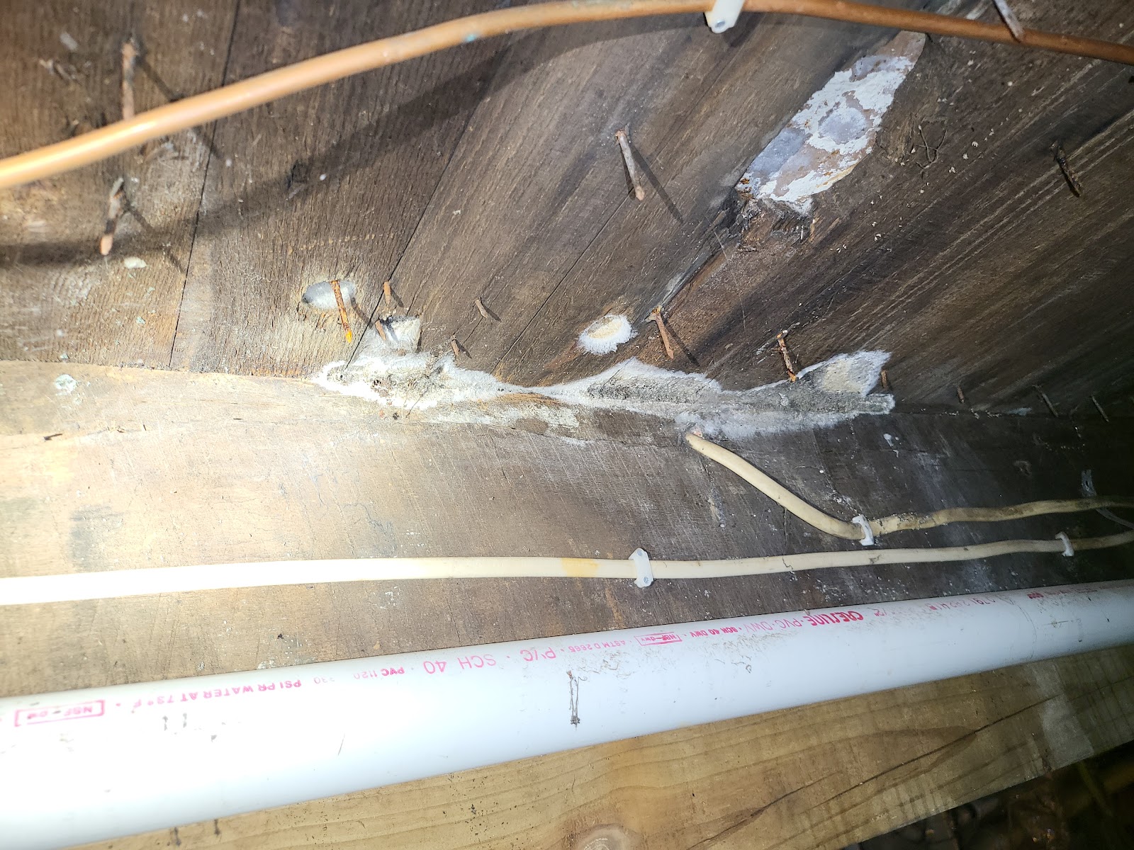 Damaged pipes causing water leak in crawlspace discovered during Water Pro Inc restoration in Bloomington Indiana