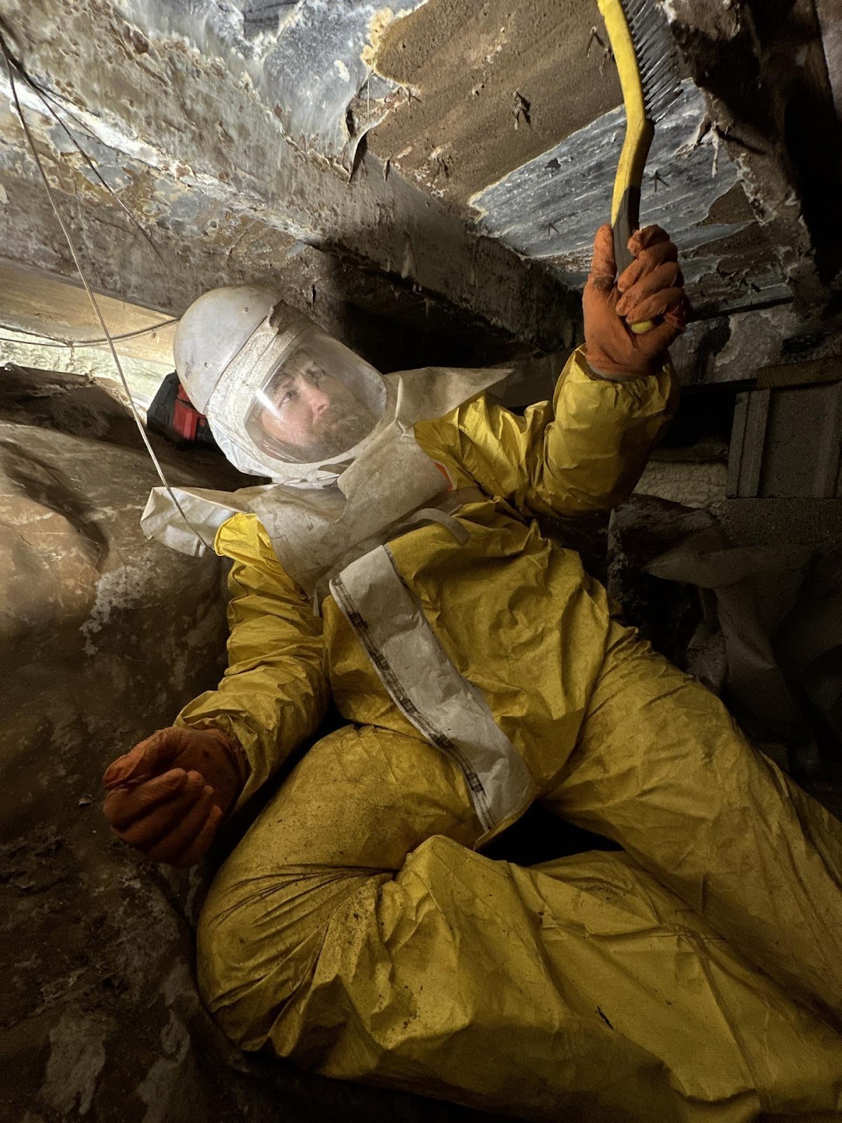 Water Pro Inc restoration crew in professional safety equipment during water damage and mold remediation project in Bloomington Indiana